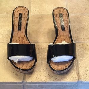 Gently used black sandals